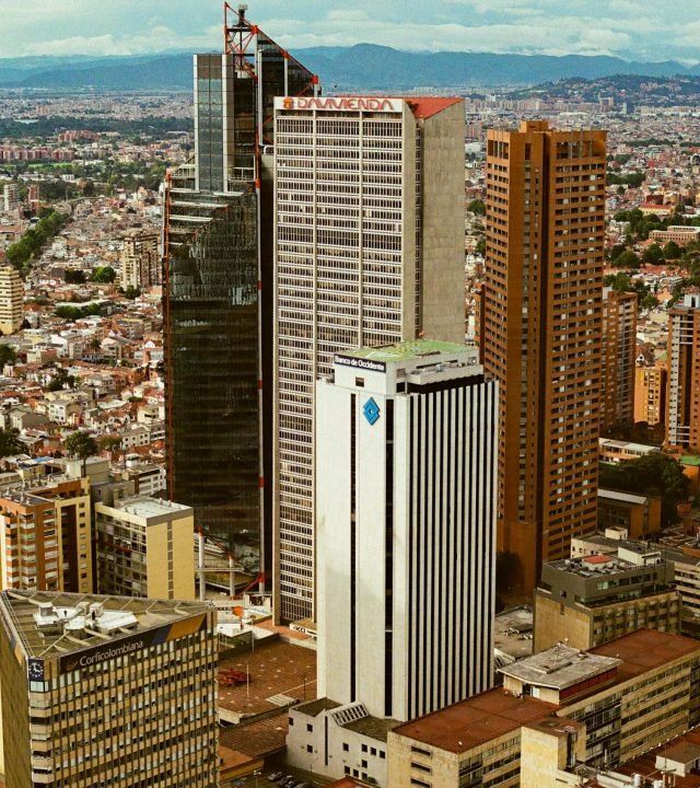 A captivating aerial view of Bogotá, Colombia, showcasing its towering skyscrapers and urban sprawl.
